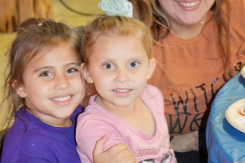 Mandy LeStourgeon with daughters Kennedy and Caleigh from Houston enjoy the Wild Game Dinner. Kennedy and Caligh are grand daughters of local Medina historian Cecil LeStourgeon. BULLETIN PHOTO by Tracy Thayer